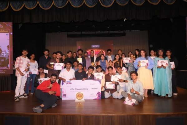 Winners and participants of Skypath Digital's DigiMelaa reel-making competition posing on stage with trophies, certificates and a
                        prize cheque of fifty thousand rupees